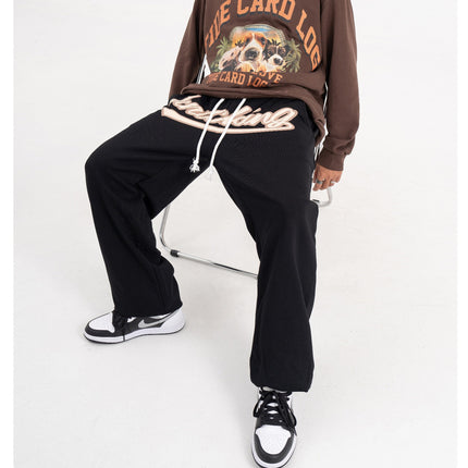 Unisex hip-hop sweatpants, streetwear joggers, relaxed fit pants, casual street style, urban fashion, lightweight joggers, breathable sweatpants, adjustable drawstring, multiple pockets joggers, street fashion trousers, versatile joggers, hip-hop wardrobe, trendy casual pants, athletic joggers, everyday sweatpants, gym joggers, lounging pants, stylish sweatpants, men’s streetwear, women’s casual joggers.