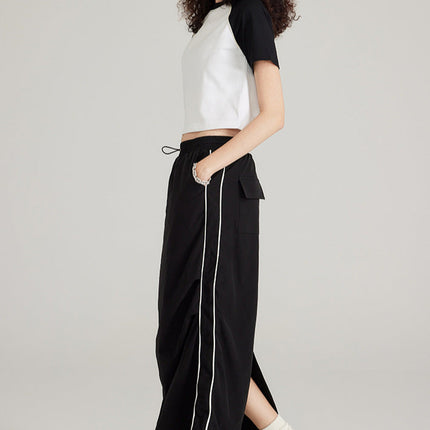 Women's cropped raglan tee
Streetwear crop top
Short sleeve casual t-shirt
Urban fashion top
Sporty crop top
Oversized crop top