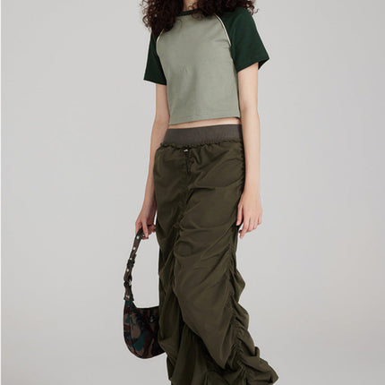 Women's cropped raglan tee
Streetwear crop top
Short sleeve casual t-shirt
Urban fashion top
Sporty crop top
Oversized crop top