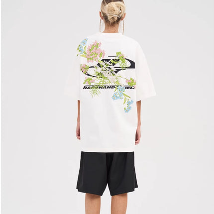 Oversized embroidered t-shirt
Floral embroidery t-shirt
Streetwear embroidered tee
Designer embroidered t-shirt
Unisex oversized t-shirt
Trendy streetwear fashion
High-quality embroidery tee