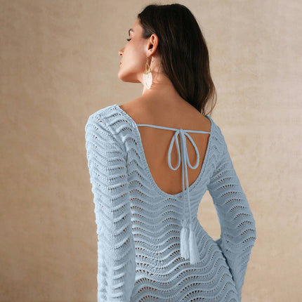 Crochet beach cover-up
Long sleeve beach dress
Open-back cover-up dress
Summer vacation outfit
Lightweight beachwear
Resort-style dress
Boho beach cover-up
Elegant swimsuit cover-up
