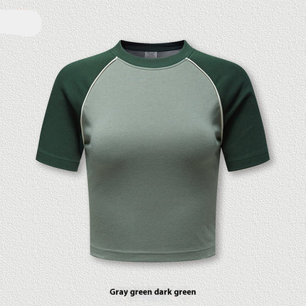 Women's cropped raglan tee
Streetwear crop top
Short sleeve casual t-shirt
Urban fashion top
Sporty crop top
Oversized crop top