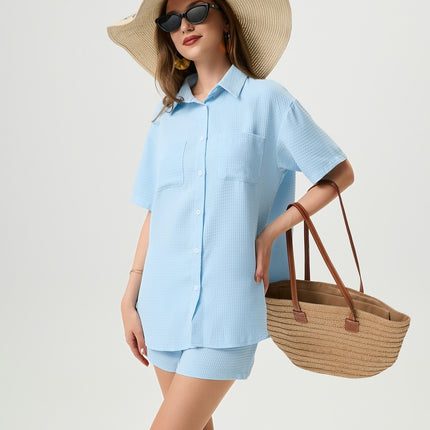 Light blue lounge set
Waffle-textured two-piece set
Oversized shirt and shorts set
Summer co-ord set for women
Casual chic loungewear
Trendy vacation outfit 2025