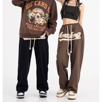 Unisex hip-hop sweatpants, streetwear joggers, relaxed fit pants, casual street style, urban fashion, lightweight joggers, breathable sweatpants, adjustable drawstring, multiple pockets joggers, street fashion trousers, versatile joggers, hip-hop wardrobe, trendy casual pants, athletic joggers, everyday sweatpants, gym joggers, lounging pants, stylish sweatpants, men’s streetwear, women’s casual joggers.