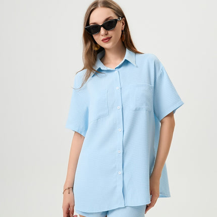 Light blue lounge set
Waffle-textured two-piece set
Oversized shirt and shorts set
Summer co-ord set for women
Casual chic loungewear
Trendy vacation outfit 2025