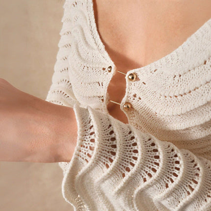 Crochet beach cover-up
Long sleeve beach dress
Open-back cover-up dress
Summer vacation outfit
Lightweight beachwear
Resort-style dress
Boho beach cover-up
Elegant swimsuit cover-up
