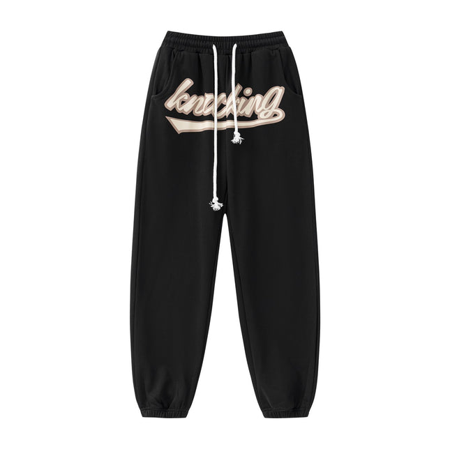 Unisex hip-hop sweatpants, streetwear joggers, relaxed fit pants, casual street style, urban fashion, lightweight joggers, breathable sweatpants, adjustable drawstring, multiple pockets joggers, street fashion trousers, versatile joggers, hip-hop wardrobe, trendy casual pants, athletic joggers, everyday sweatpants, gym joggers, lounging pants, stylish sweatpants, men’s streetwear, women’s casual joggers.