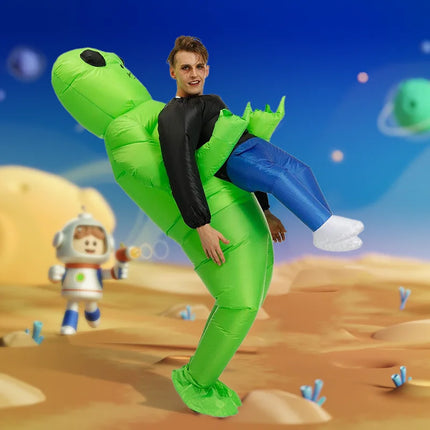 Person in a green inflatable dinosaur costume on a space-themed background with an astronaut figure.