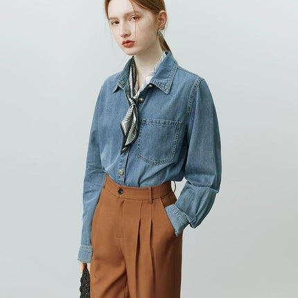 Denim button-up shirt
Women’s casual denim top
Vintage denim fashion
Long sleeve denim blouse
Classic denim shirt outfit