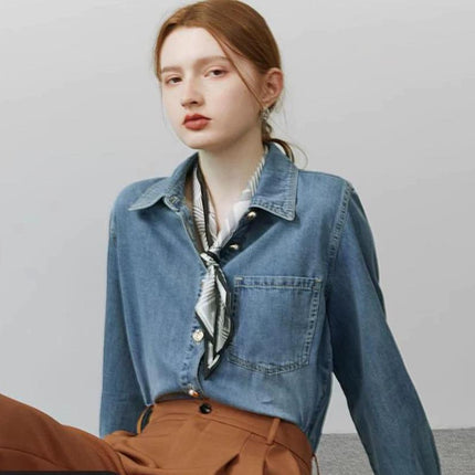 Denim button-up shirt
Women’s casual denim top
Vintage denim fashion
Long sleeve denim blouse
Classic denim shirt outfit