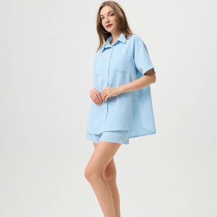 Light blue lounge set
Waffle-textured two-piece set
Oversized shirt and shorts set
Summer co-ord set for women
Casual chic loungewear
Trendy vacation outfit 2025