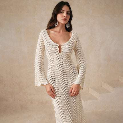 Crochet beach cover-up
Long sleeve beach dress
Open-back cover-up dress
Summer vacation outfit
Lightweight beachwear
Resort-style dress
Boho beach cover-up
Elegant swimsuit cover-up
