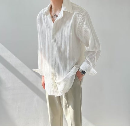Camisa plisada de manga larga para hombre: elegante camisa texturizada con botones para uso casual y formal.