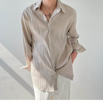 Camisa plisada de manga larga para hombre: elegante camisa texturizada con botones para uso casual y formal.