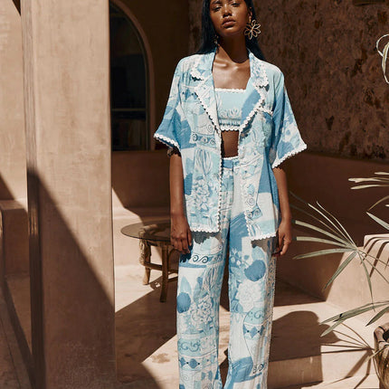 Boho-chic printed shirt and trousers set
Summer co-ord set for women
Wide-leg pants and button-down shirt
Elegant bohemian outfit
Lightweight vacation wear
Trendy summer matching se
