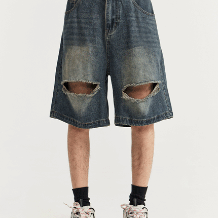 grunge-style denim shorts
men’s ripped denim shorts
streetwear shorts for men
loose fit denim shorts
retro ripped shorts
distressed denim shorts men