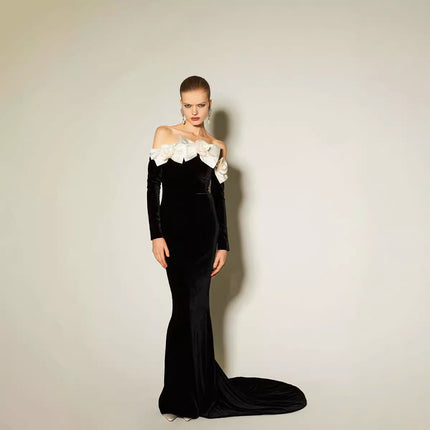 Black velvet gown, off-shoulder evening dress, white floral gown, formal black dress, gala outfit, long elegant dress, luxury evening wear, red carpet dress, fitted formal gown, women’s event dress