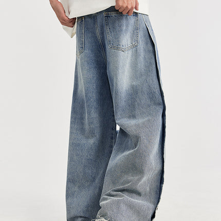 men's wide-leg jeans, ripped denim, vintage wash jeans, baggy streetwear jeans, loose-fit jeans, trendy men's denim, casual street style, frayed knee jeans, urban fashion.