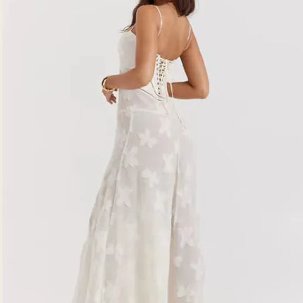floral maxi dress
embossed maxi dress
formal gown
sleeveless gown
wedding dress
special occasion dress
textured maxi dress floral
sophisticated maxi gown
contemporary formal dress