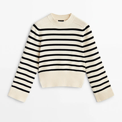 Striped sweater with black and white stripes on a white background