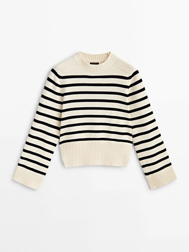 Striped sweater with black and white stripes on a white background